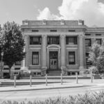 Black and white photo of the exterior of architecture hall