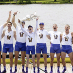 Team of rowers cheering