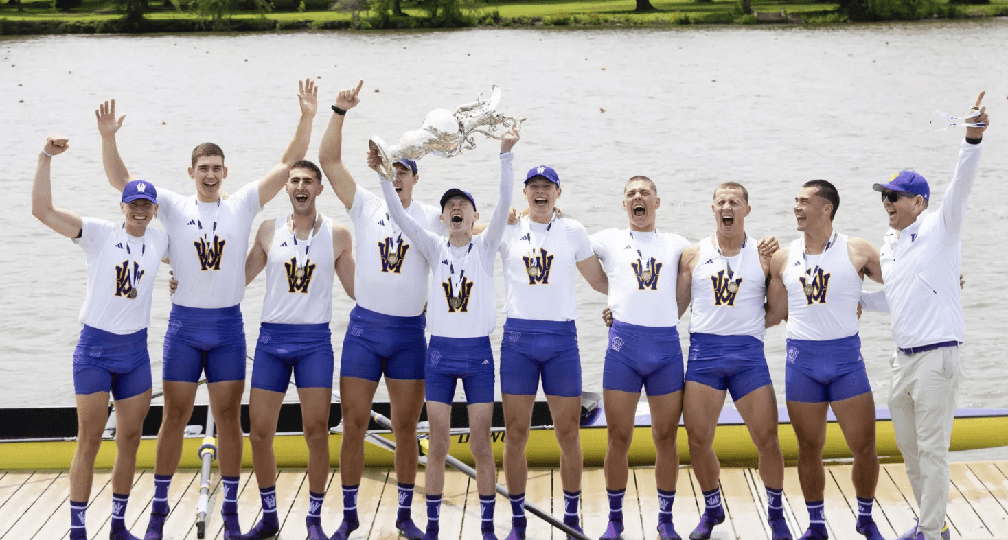 Team of rowers cheering