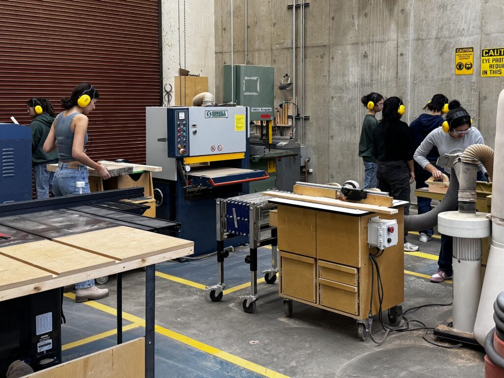 students making tables in Architecture 231 studio